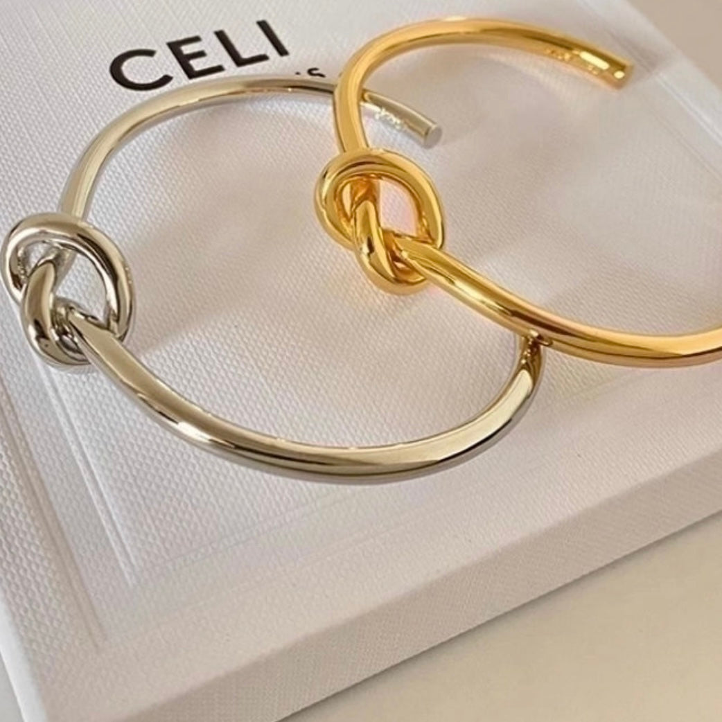 Stainless Steel Knot Bangle in Silver or Gold Plate