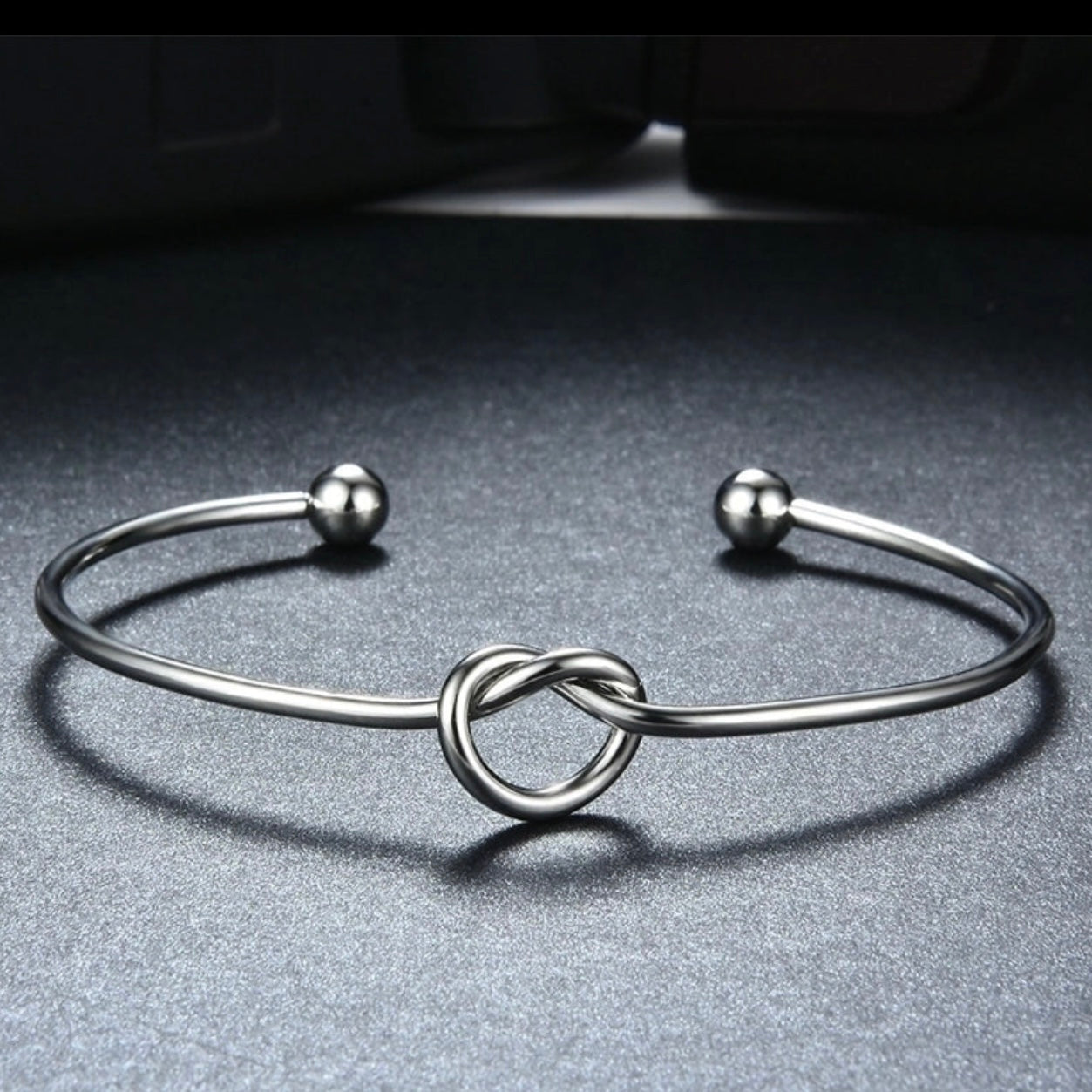 Stainless Steel Knot Bangle in Silver or Gold Plate