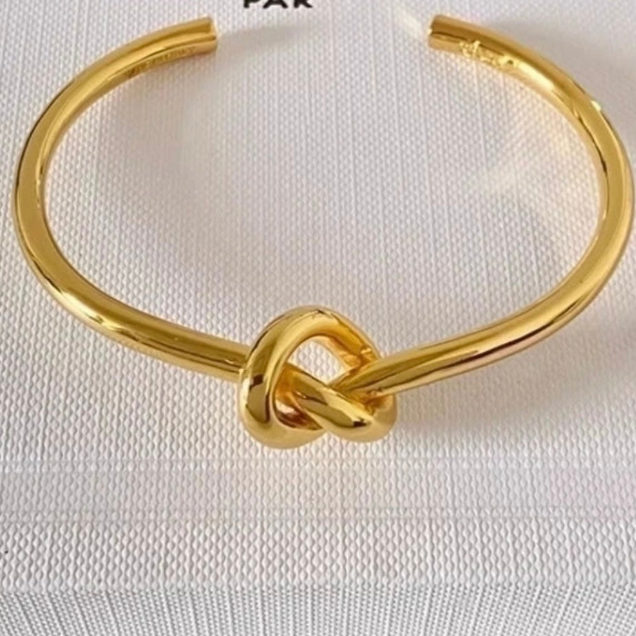 Stainless Steel Knot Bangle in Silver or Gold Plate